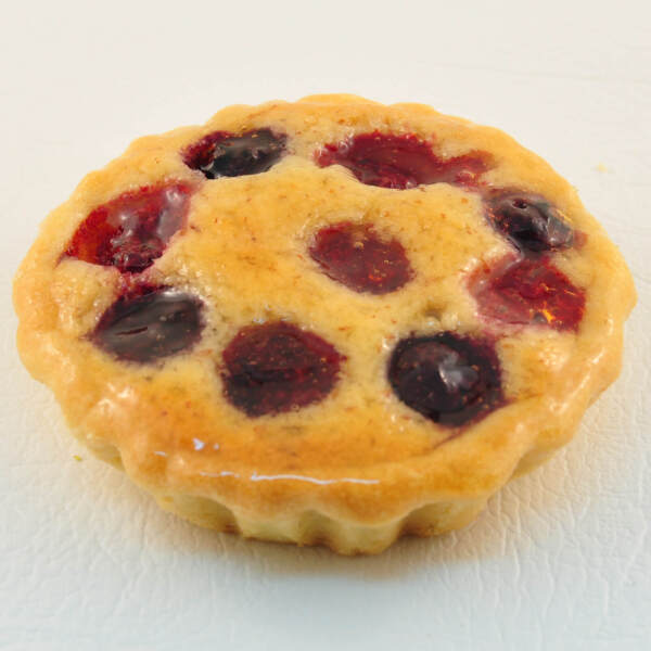Individual berry and almond flan